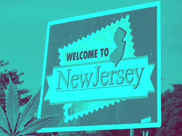 Sign reading, " Welcome to New Jersey" in a green duotone. With a medicinal cannabis leaf.