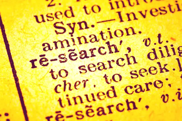 Picture of a page from a dictionary spelling the word research.