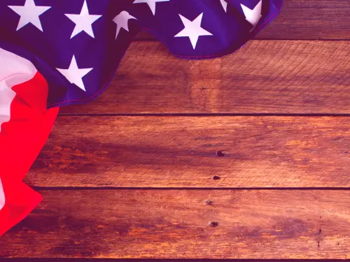 Veteran flag on a wooden table.